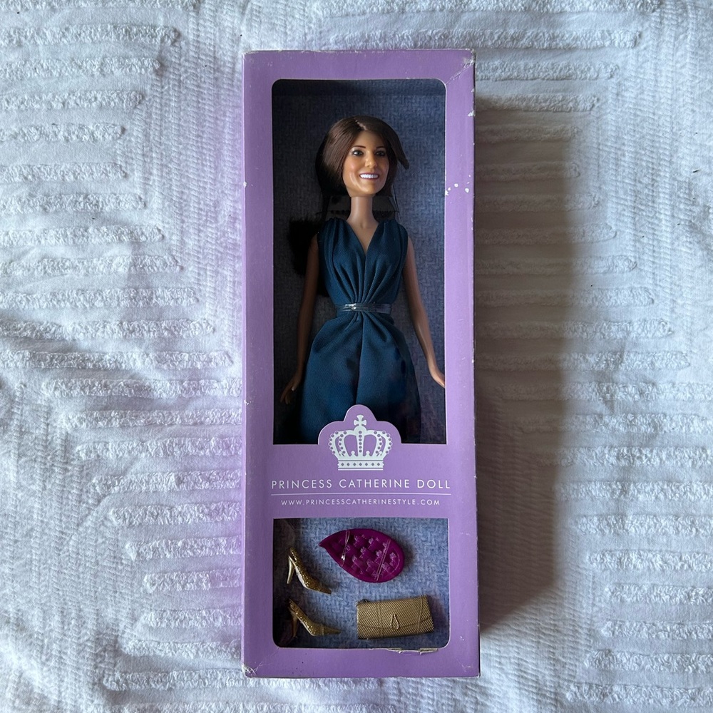 Princess Catherine doll in a blue engagement dress